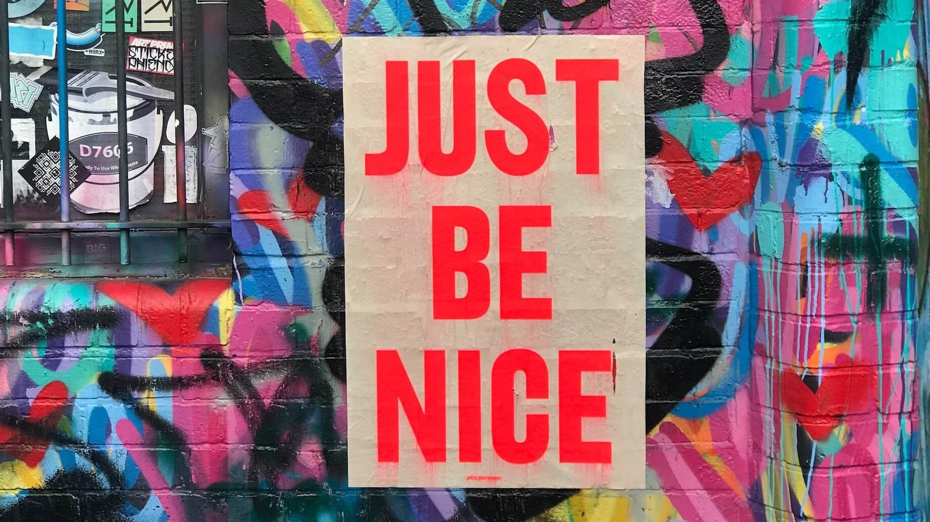 Poster with the message "Just be nice," promoting a culture of kindness